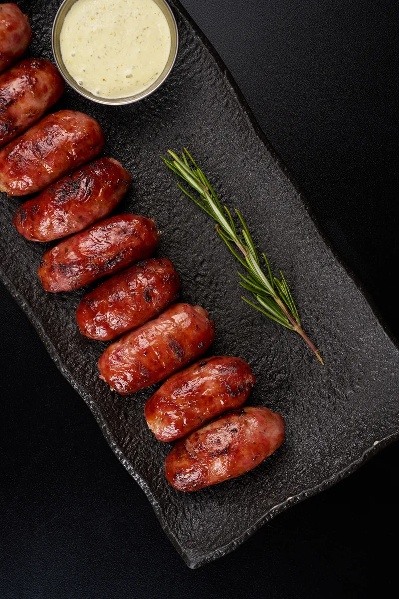 Chorizo Lo D'Alex — house-made signature grilled chorizo sausage at Lo D'Alex Restaurant Miami