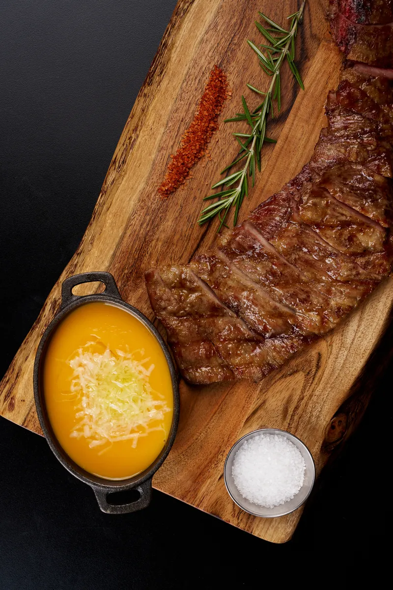 Ibérico Secreto — Spanish premium pork cut from acorn-fed Ibérico pigs, grilled to perfection at Lo D'Alex Miami