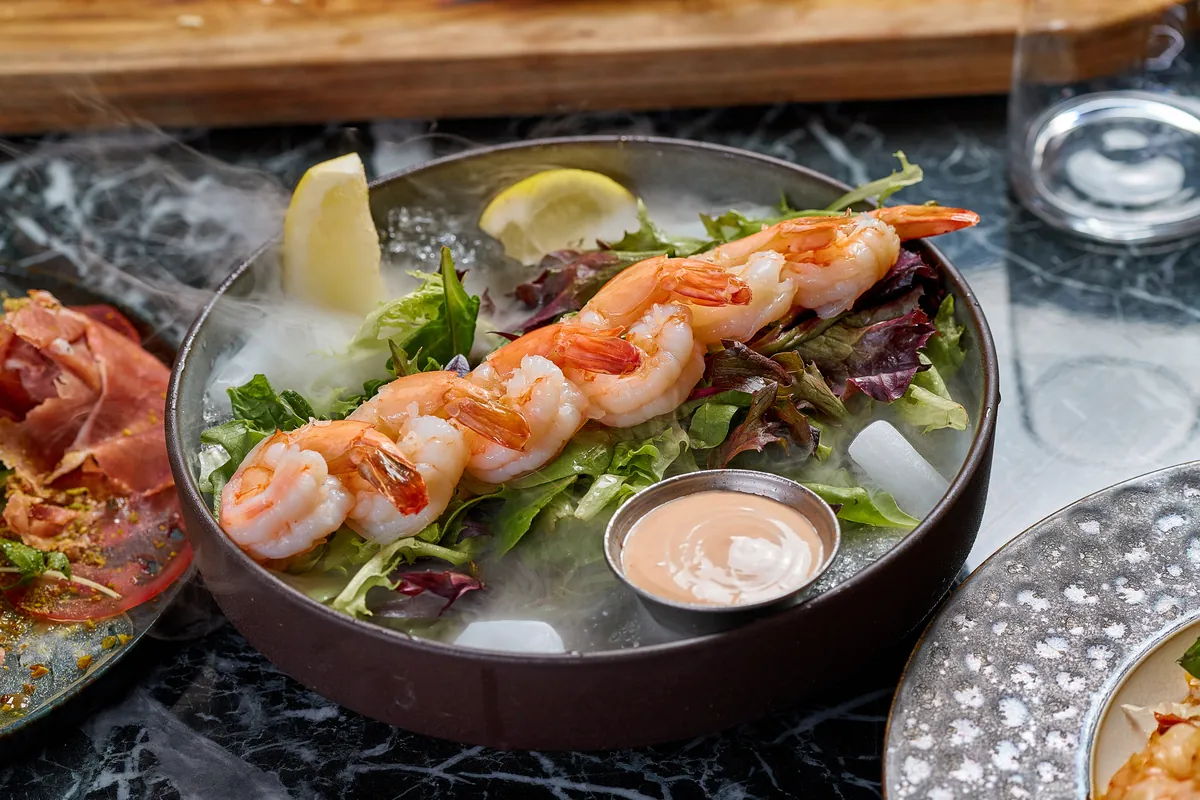 Classic Shrimp Cocktail with fresh gulf shrimp and house cocktail sauce — appetizer served at Lo D'Alex Restaurant Calle 8 Miami