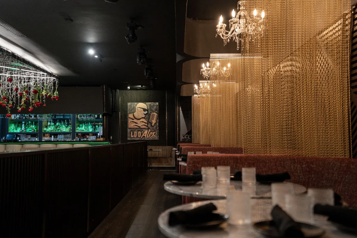 Lo D'Alex bar and intimate dining room with chandeliers